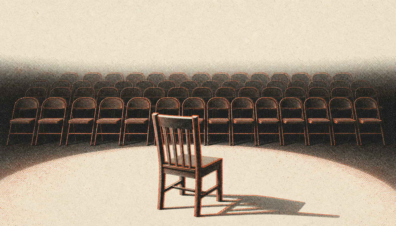 Empty audience facing a single chair, illustrating the silence test for performative masculinity
