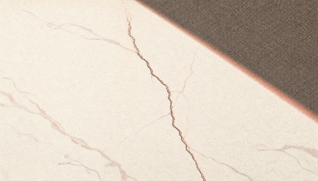 Cracked marble representing the hidden fragility that led to a premeditatio malorum practice